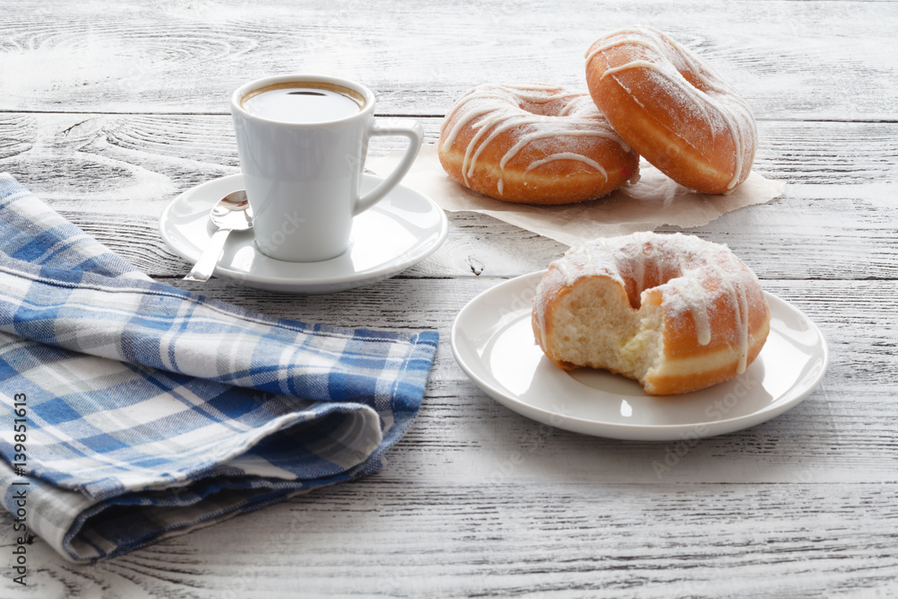 Coffee with Donuts on white table Coffee with Donuts on white table