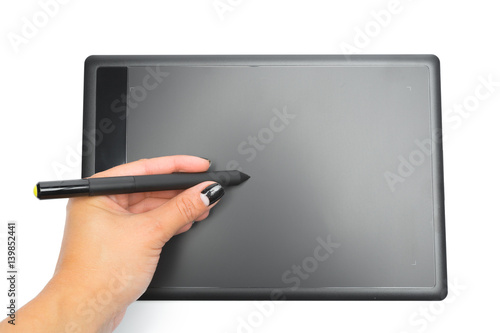 Graphic tablet with pen and hand for illustrators and designers, isolated on white background