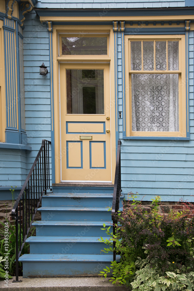 Fototapeta premium Traditional architecture of a Victorian home in urban America.