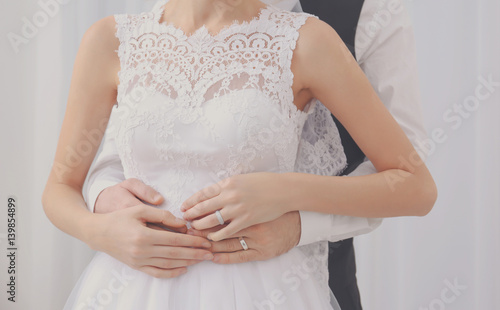 Cute happy wedding couple a...