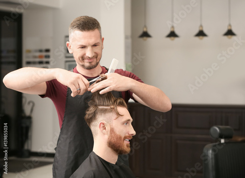 Barber making modern male h...