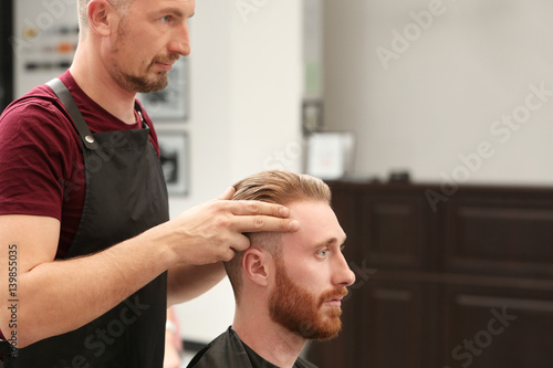 Barber making modern male h...