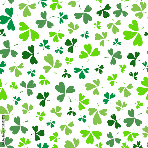 Abstract doodle seamless St Patrick s day background decorated with shamrock leaves. Wrapping paper design  banner