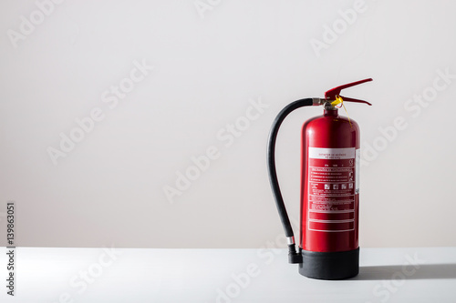 Red fire extinguisher photo