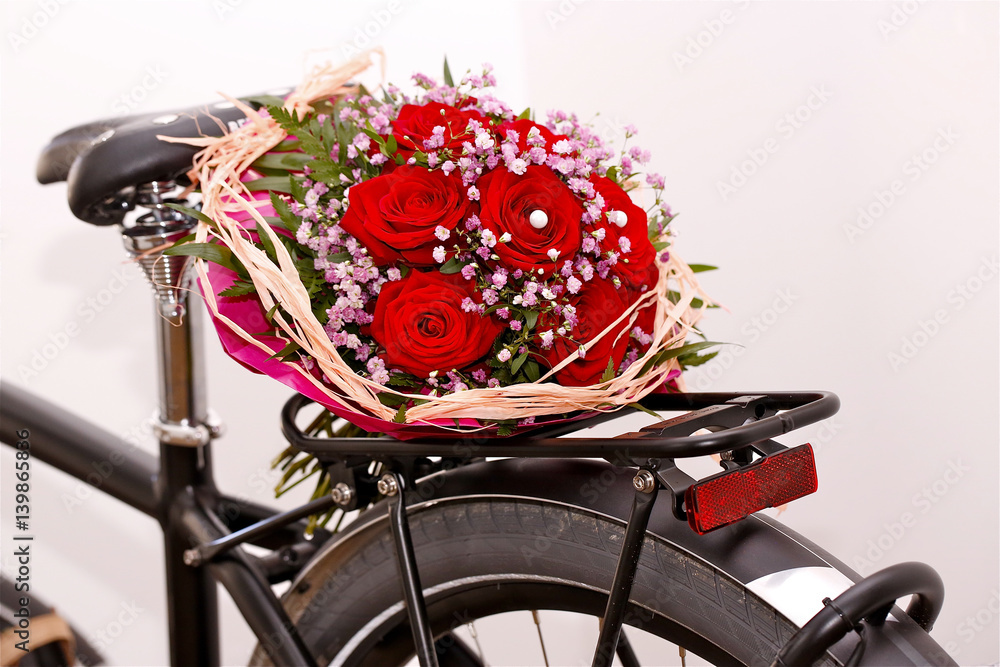 Fototapeta premium Flowers on old bicycle