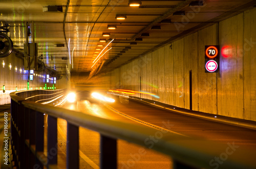Photography Truck driving through the tunnel by night