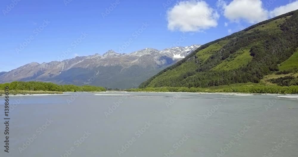 Aerial view of Mountains over remote river, Glenorchy, Central Otago, New Zealand Aerial view of Mountains over remote river, Glenorchy, Central Otago, New Zealand