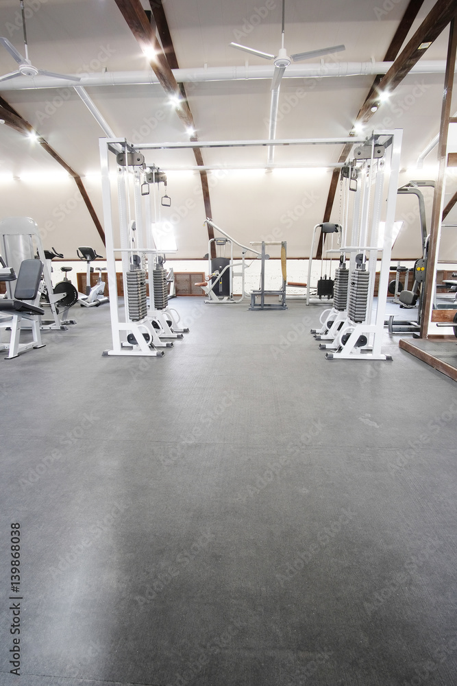 Fototapeta premium Fitness hall with fitness machines