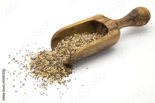 Flax, chia and sesame seeds in wooden scoop