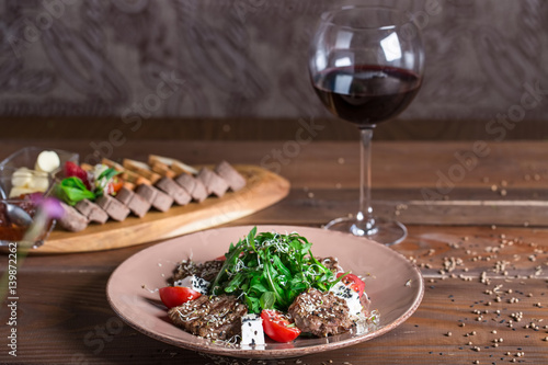 Warm salad with meat and feta