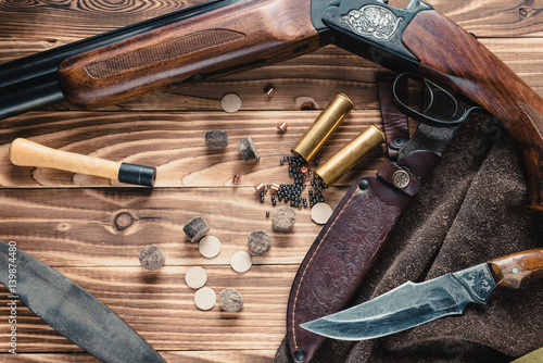 Set of  hunting equipment on desk