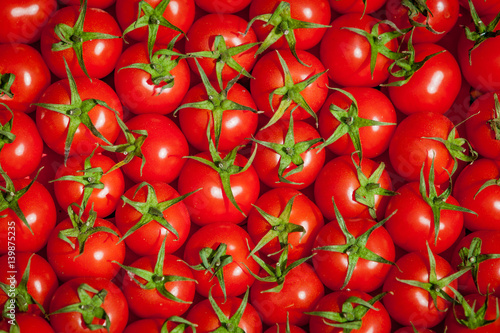 red tomatoes background. Group of tomatoes.tomato © EwaStudio