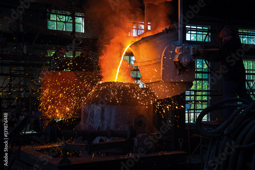 pouring steel into the converting furnace