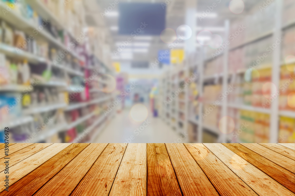 Wooden board empty table in front of blurred background. Perspective light wood over blur in supermarket - can be used for display or montage your products. Mock up for display of product. Wooden board empty table in front of blurred background. Perspective light wood over blur in supermarket - can be used for display or montage your products. Mock up for display of product.