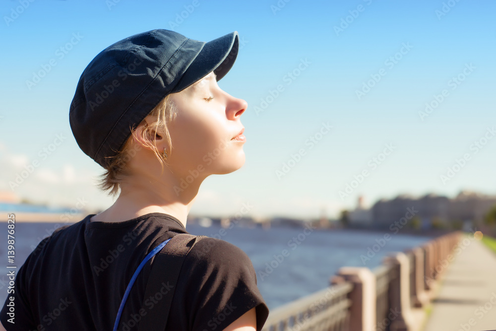Young relaxing woman at sunny day