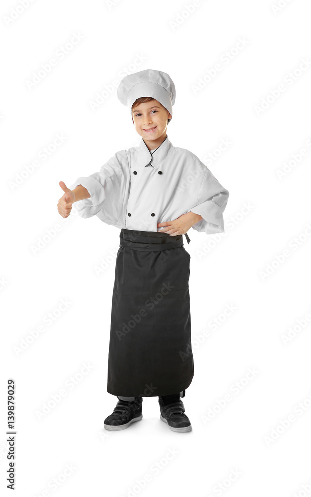 Cute boy in chef uniform on white background Cute boy in chef uniform on white background
