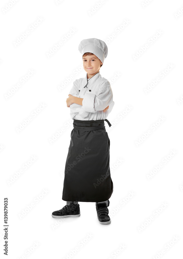 Cute boy in chef uniform on white background Cute boy in chef uniform on white background
