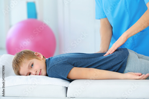 Physiotherapist working wit...