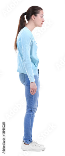 Posture concept. Young woman on white background