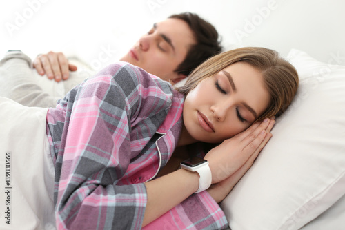 Young woman with sleep trac...