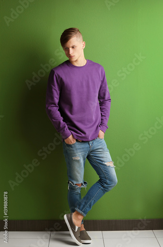 Handsome young man standing...