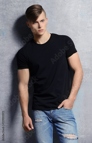 Handsome young man near tex...