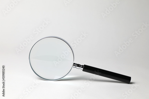magnifying glass on the white table
