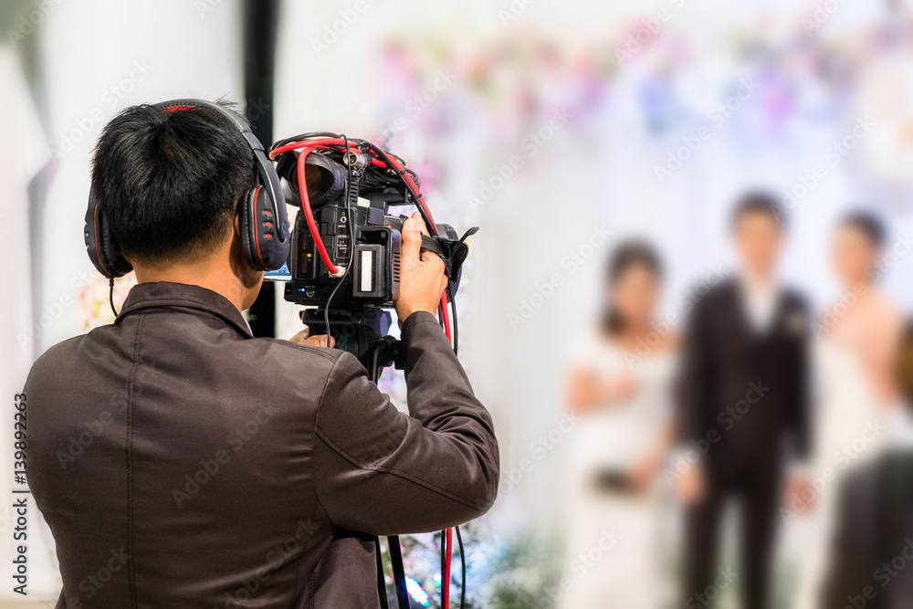 professional videographer recording wedding ceremony day professional videographer recording wedding ceremony day