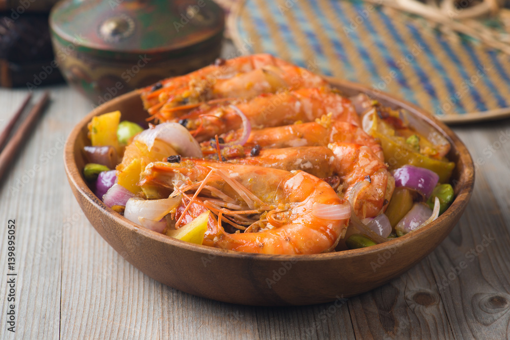 chilli prawns in traditional setting chilli prawns in traditional setting