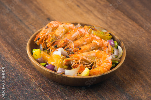 chilli prawns in traditional setting