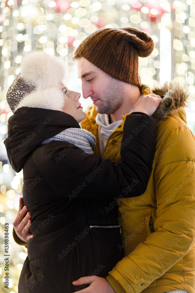 Happy couple on a romantic walk at night city Happy couple on a romantic walk at night city