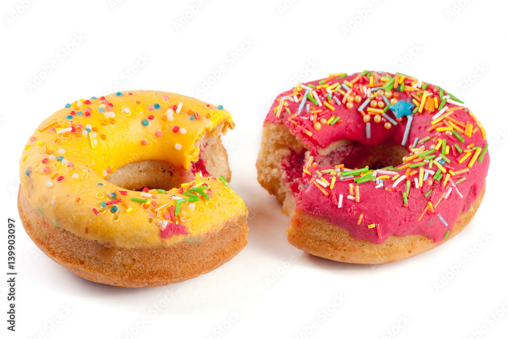 two glazed donut with a bite isolated on white background two glazed donut with a bite isolated on white background