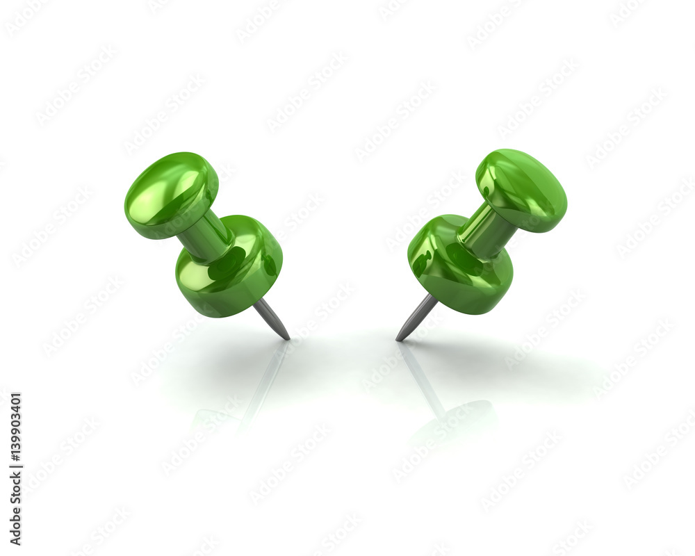 Two green push pins Two green push pins
