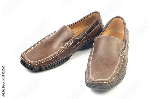 Pair a shoe a brown leather. Man's shoes isolated on a white background © chokniti