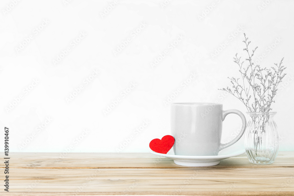 Coffee cup mug with red heart shape on wooden table , Romance and love valentines day background concept Coffee cup mug with red heart shape on wooden table , Romance and love valentines day background concept