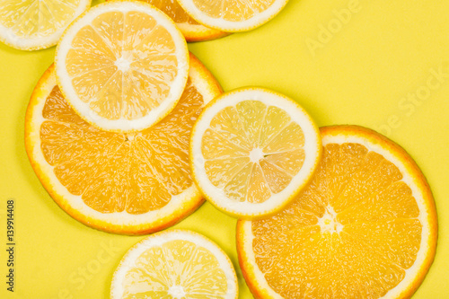 citrus fruits on a yellow background