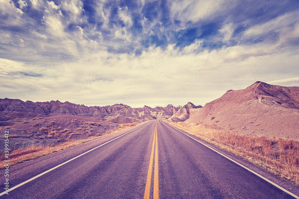 Vintage toned scenic desert highway, travel concept, USA