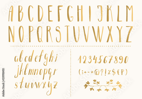 Golden hand drawn letters and numbers