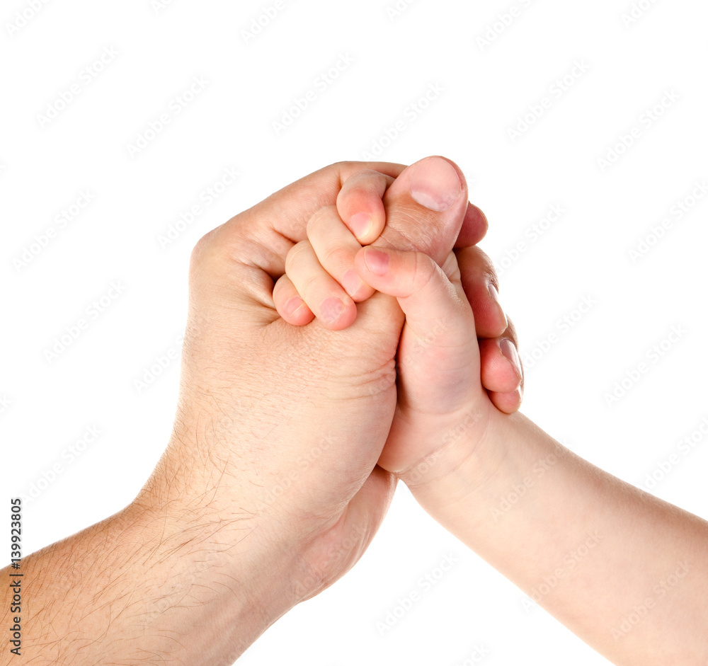 Child holds father's finger isolated