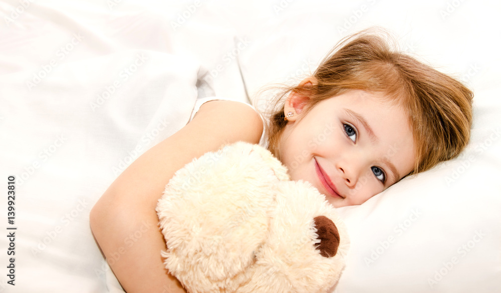 Adorable little girl in the bed Adorable little girl in the bed