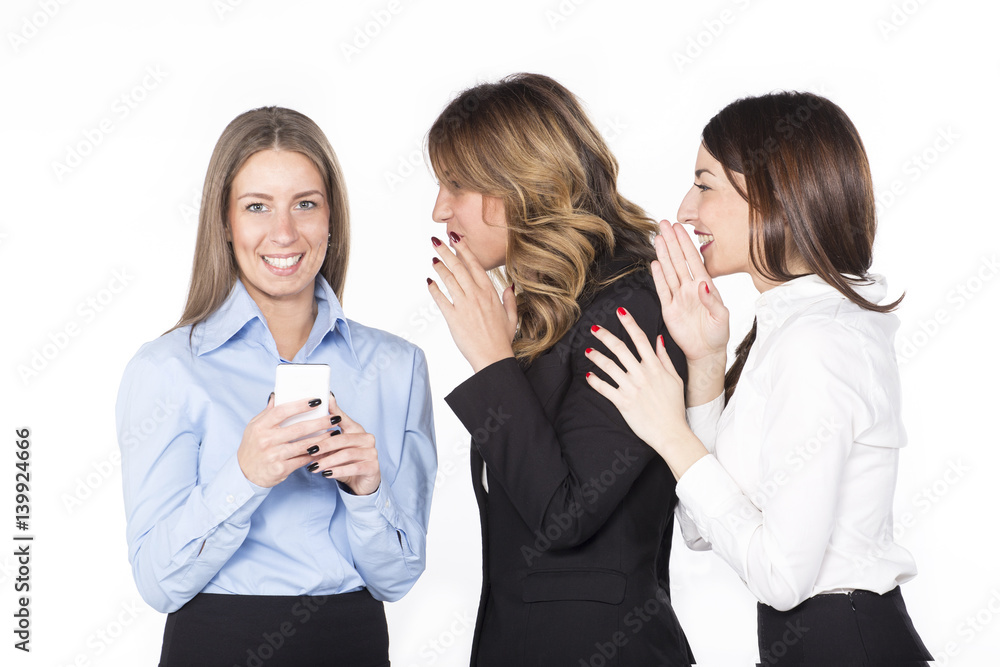 Three businesswoman gossiping isolated on white Three businesswoman gossiping isolated on white
