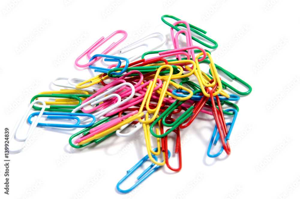 Bunch of colorful paper clips on white backgrpund Bunch of colorful paper clips on white backgrpund