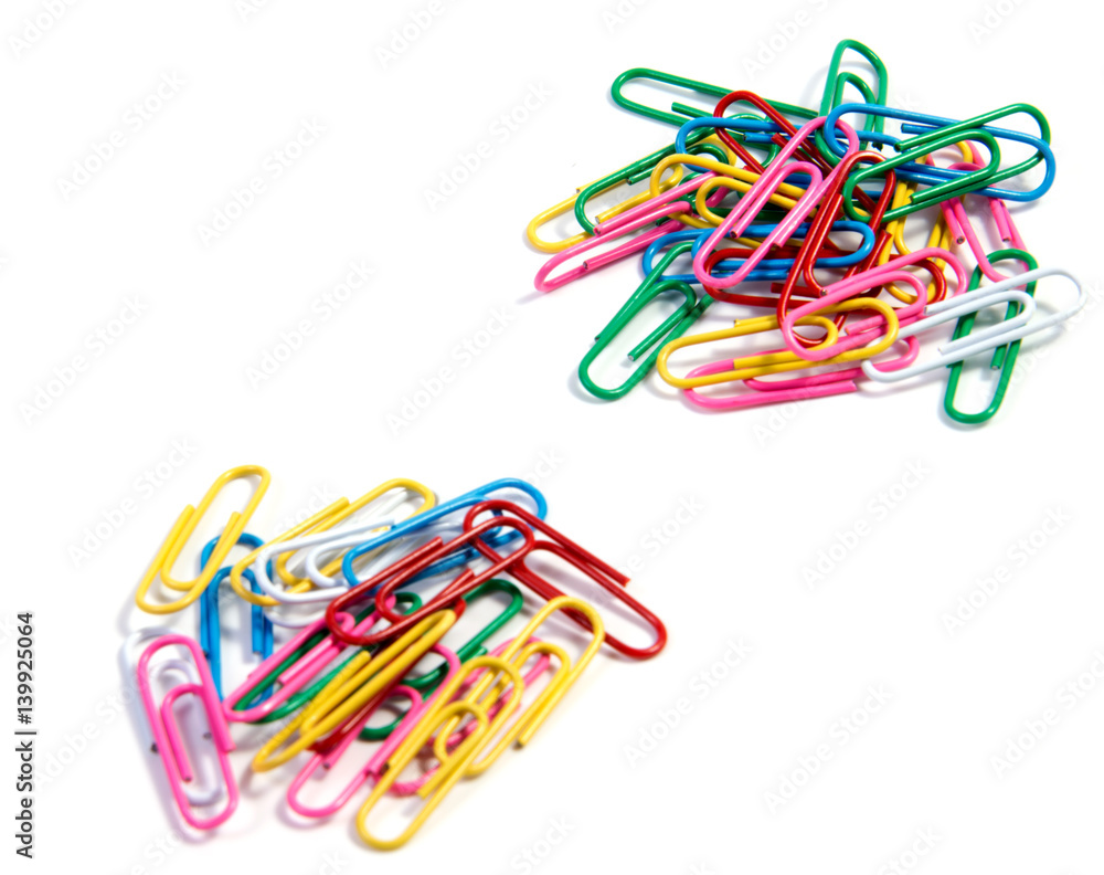 Bunch of colorful paper clips on white backgrpund Bunch of colorful paper clips on white backgrpund