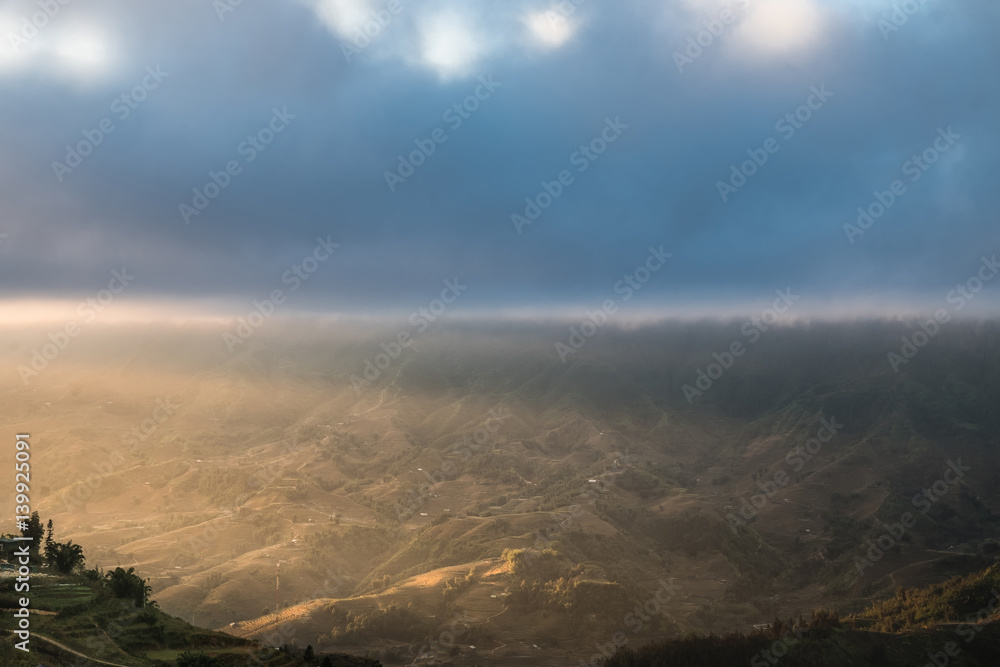 fog and cloud  with sunrise  shine to the mountain valley landscape, SAPA Vietnam.