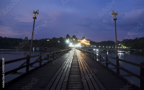 old an long wooden bridge at Sangklaburi,Kanchan aburi province, Thailand © chokniti