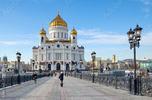 Moscow, Russia - February 16, 2017: The Cathedral of Christ the Savior and Patriarchal bridge a Sunny winter day © koromelena