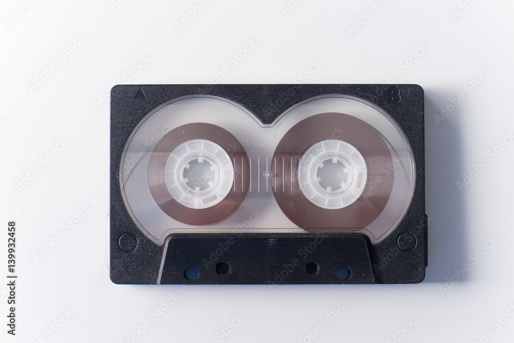 Fototapeta premium One black audio cassette on white background