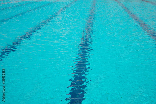 blue swimming pool with lane line for summer activities background