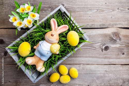 Easter holiday bunny with eggs and flowers