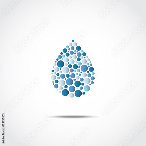 Abstract drop of dots of different sizes. Vector illustration.